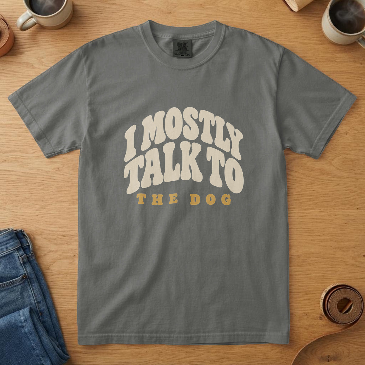 Pepper t-shirt with bone and mustard arch lettering reading "I MOSTLY TALK TO THE DOG"