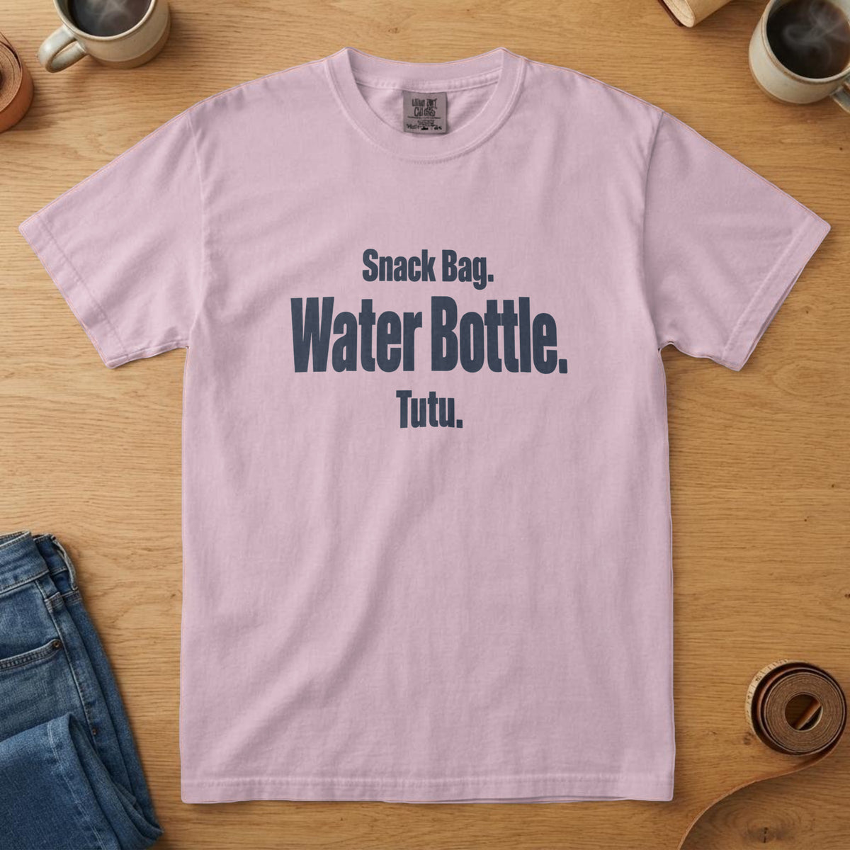 Blossom t-shirt with bold navy checklist type and the words "Snack Bag. Water Bottle. Tutu."