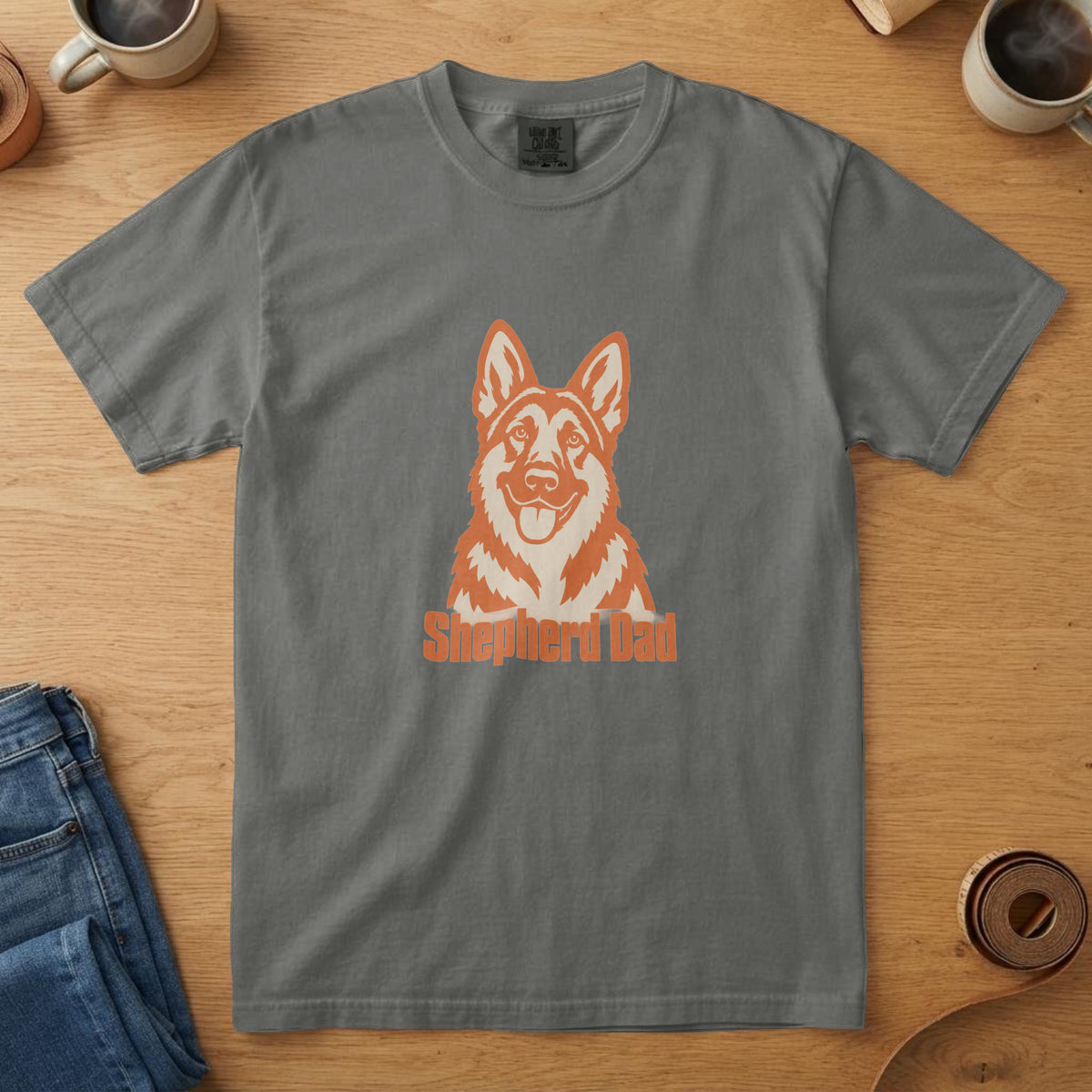 Pepper t-shirt with a bone and orange German Shepherd portrait ears up and the words "Shepherd Dad"