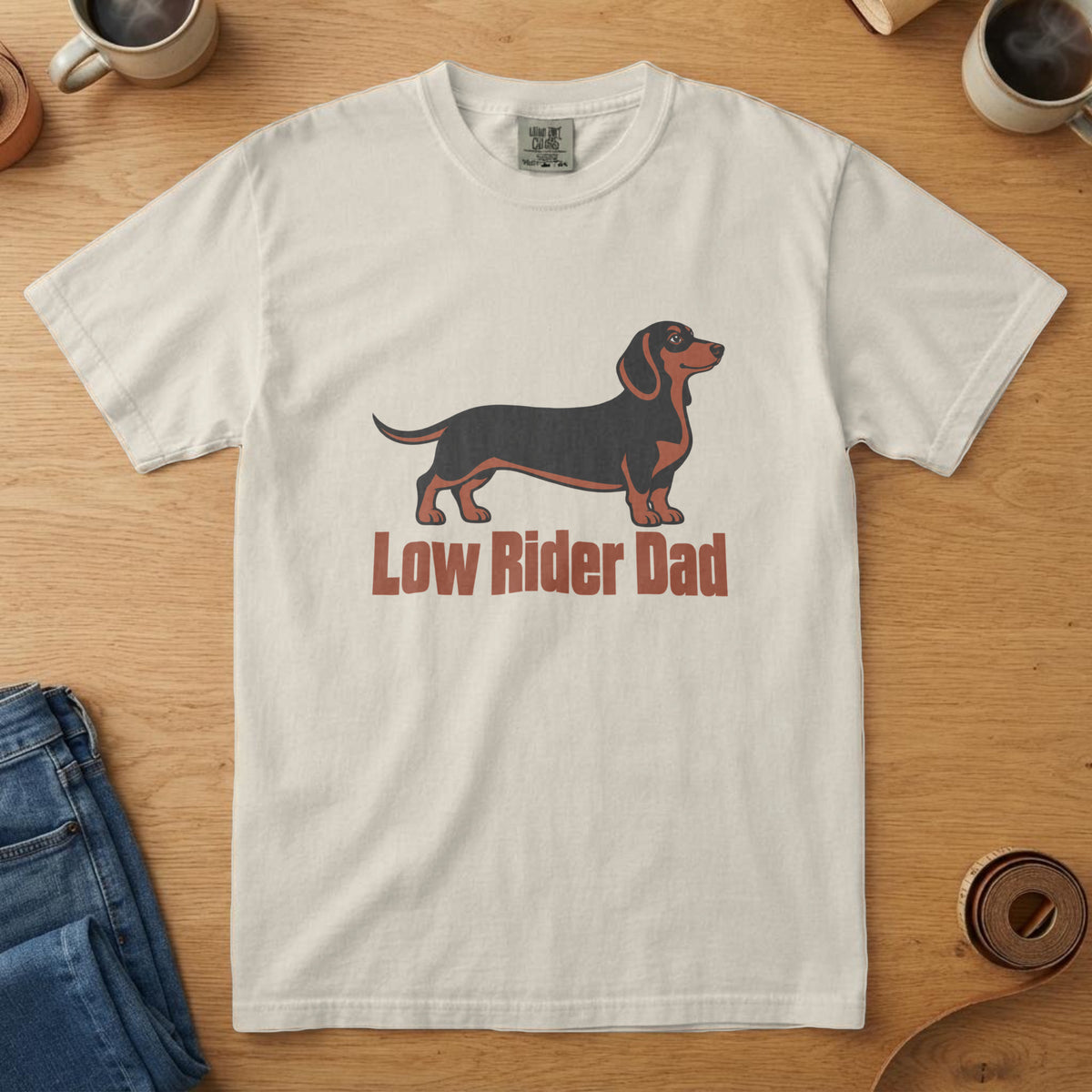Ivory t-shirt with a near-black and rust Dachshund in side profile and the words "Low Rider Dad"